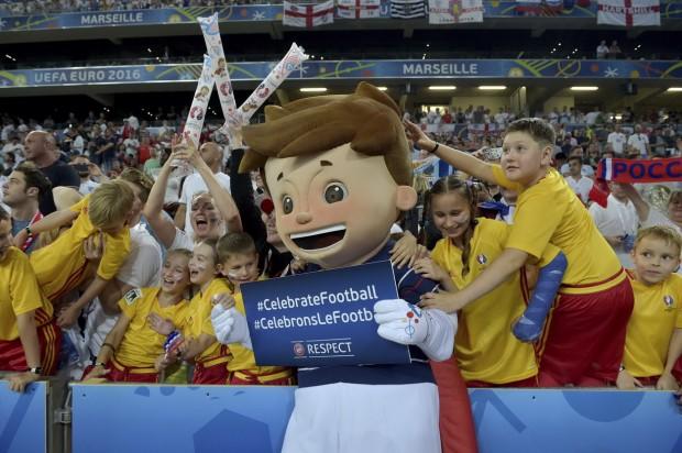 McDonald's player escorts meet Super Victor at the match 4 between England and Russia, at the Velodrome Stadium in Marseille, France, on 11th of June 2016.