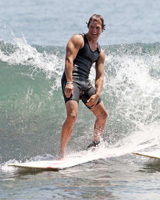 New dad Matthew McConaughey spends a warm Malibu day surfing with friends. Pictured: Matthew McConaughey Ref: SPL44454 160808 Picture by: MAP / Splash News Splash News and Pictures Los Angeles: 310-821-2666 New York: 212-619-2666 London: 870-934-2666 photodesk@splashnews.com 