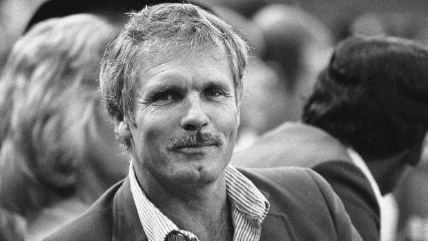 Atlanta Braves owner Ted Turner watches his team in action against the St. Louis Cardinals during the first National League Championship game, Wednesday, Oct. 6, 1982, St. Louis, Mo. Turners Braves led the Cardinals 1-0 in the fifth inning. (AP Photo/Rusty Kennedy)