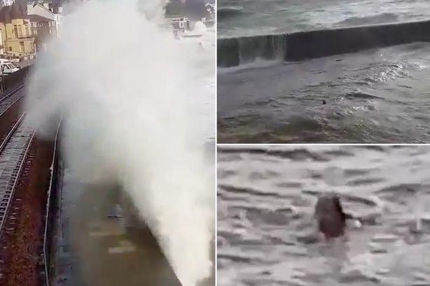 MAIN-Man-goes-swimming-in-huge-waves-as-Storm-Doris-strikes