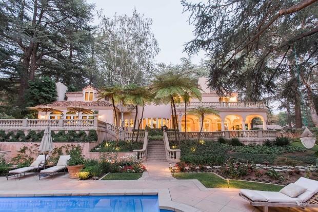 PIC FROM PARTNERS TRUST / CATERS NEWS - (PICTURED: The luxury Hollywood mansion.) A luxury villa built as a personal retreat for Hollywood star Kevin Costner has gone on sale for an untouchable .59M (3.56M). Commission by the Oscar-winning actor in 1989, the Mediterranean style mansion sits in the coveted area of la Canada Flintridge in California, USA. As well as a five-bed main house, the property comes with a connoisseurs retreat, a 1000-bottle wine cellar, a spa room and aquarium. It spans 32,000 square-feet and also boasts a library, gym and sport court. SEE CATERS COPY